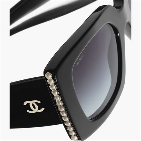 chanel sunglass with pearl|Chanel sunglasses with white trim.